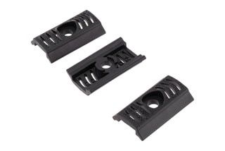 Black M-LOK rail adapter panels provide a secure grip.